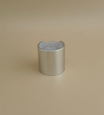 ত্বকের যত্নের বোতলগুলির জন্য স্বচ্ছ বোতাম সহ রূপালী অ্যালুমিনিয়াম-প্লাস্টিক গোলাকার মসৃণ ক্যাপ