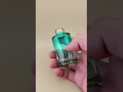 নতুন ডিজাইন ধীরে ধীরে পরিবর্তন গাঢ় স্বচ্ছ সবুজ মসৃণ কাঁচের বোতল সারমর্মের জন্য