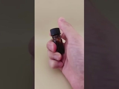 ওষুধের জন্য সূক্ষ্ম নকশা স্বচ্ছ বাদামী মসৃণ গোলাকার গ্লাসের বোতল