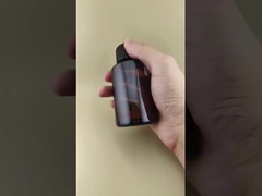 সুক্ষ্ম নকশা পরিষ্কার বাদামী মসৃণ গোলাকার গ্লাস বোতল ওষুধের জন্য বিশেষ ঢাকনা সহ