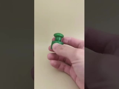 কসমেটিক বোতলগুলির জন্য বোতাম সহ সবুজ প্লাস্টিকের মসৃণ ক্যাপ