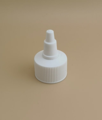 সাদা প্লাস্টিকের খাঁজকাটা জেলি ক্যাপ যা পেইন্ট বোতলগুলির জন্য